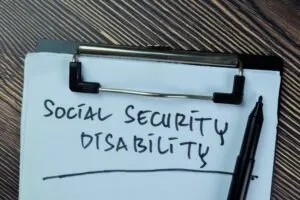 A notepad reads ‘Social Security Disability’. How much can I earn a month while on SSDI?