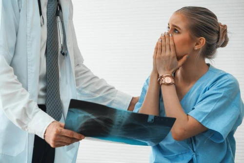 An unhappy patient learns about an instance of medical malpractice.