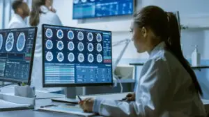 female-medical-research-scientist-working-on-a-brain-scan