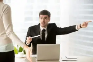 boss firing a woman inappropriately