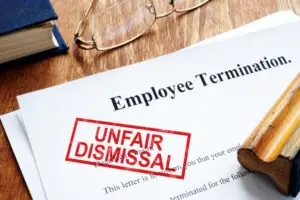 employee termination papers with unfair dismissal stamp