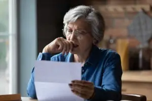 older-woman-reading-a-wrongful-termination-notice