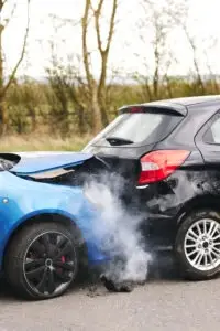 smoking-blue-car-in-rear-end-crash