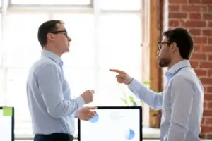man arguing with boss at the office