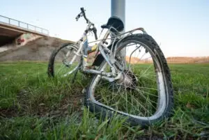 crashed bicycle with crushed wheel