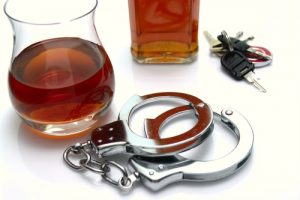 Handcuffs, alcohol and keys