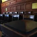 An empty jury box in a courtroom