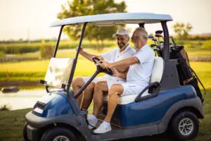 people in a golf cart