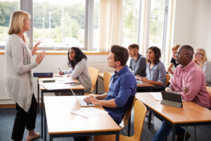 teacher teaching adult class