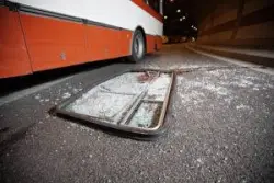 shattered window after bus accident