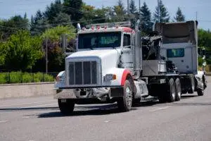 commercial truck driving down highway