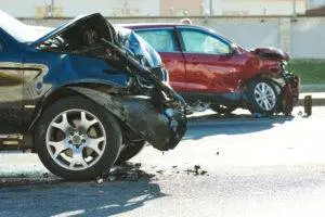 damaged cars after motor vehicle crash