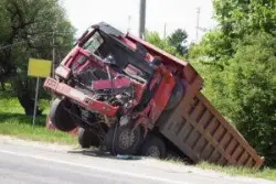 wrecked truck in ditch