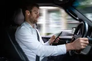 motorist texting behind the wheel