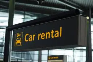 a sign with the words car rental