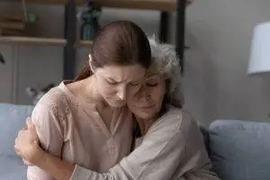 mother and daughter grieving lost loved one