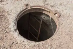dangerous open manhole