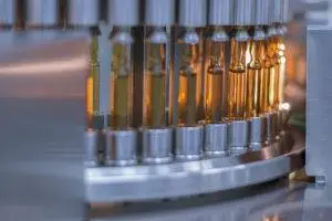 drug ampoules undergoing inspection