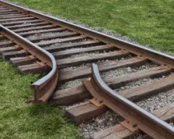 train track with broken and bent rails