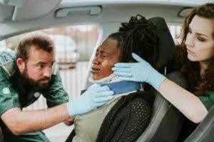 woman getting cervical collar after accident
