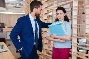 woman trapped by male coworker