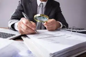 businessman examining documents