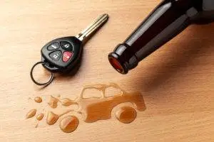 car key and beer spilled to form car
