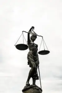 lady justice wearing blindfold holding scales