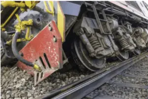 train derailed on side of tracks