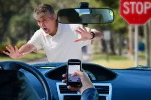 distracted driver about to hit pedestrian