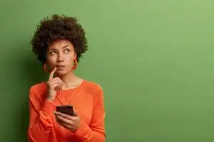 woman researches legal questions on phone