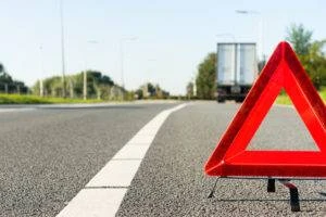 A truck accident on the road. Injured victims will need a lawyer to sue Walmart for damages.