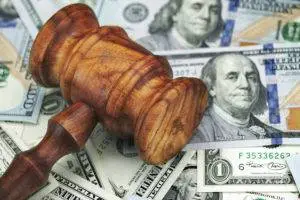 gavel-sits-on-top-of-pile-of-money