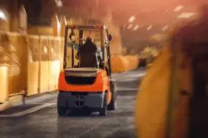 Forklift Speeding Through A Warehouse