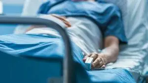 patient-lies-in-hospital-bed-to-receive-treatment-for-catastrophic-injury