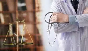 A doctor with arms crossed next to the scales of justice.