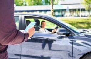 A St. Charles rideshare client enters a car before calling a St. Charles rideshare accident lawyer.