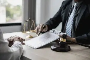Mt, Vernon commercial litigation attorney explains contract dispute to client.