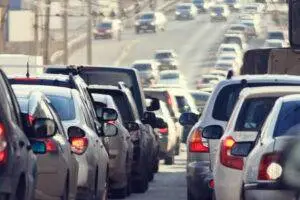Heavy traffic on an inner-city interstate.