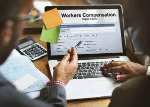 An attorney helps a client file a workers’ compensation claim after an accident.