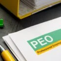 Paperwork displays the agreement between a company and a PEO offering employee management leasing services at a low cost.