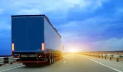 A truck on a highway. Discuss options for total damages with a Riverside Route 60 truck accident lawyer.