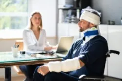 An injured accident victim goes to a free case evaluation with a San Diego catastrophic injury lawyer.