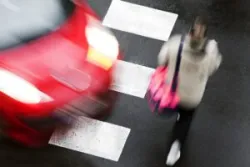 A negligent driver is about to hit a woman crossing the street. A pedestrian accident lawyer in San Jose Will help the injured victim hold the reckless driver accountable.