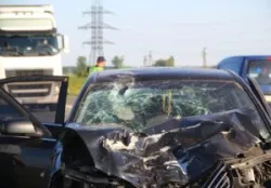 A car after a truck accident, where the driver is wondering about the statute of limitations for a truck accident claim.