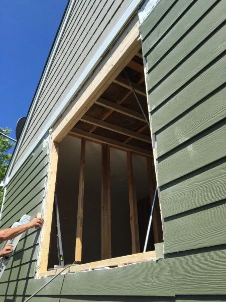 Preparing a window frame for a new window installation in Naperville