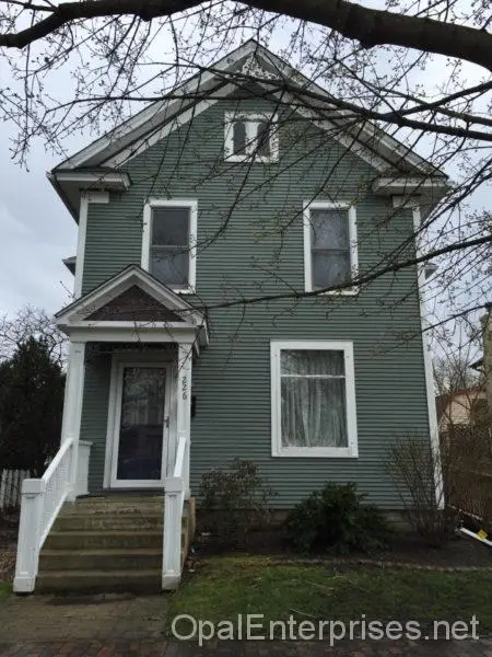 Historic Naperville home before siding replacement