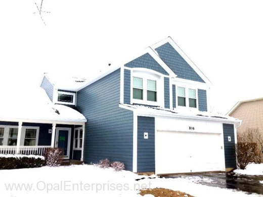 After Photo of blue James Hardie Siding Installation