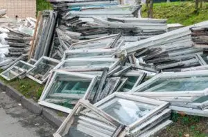 A pile of old wood windows.