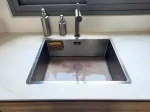 overflowing kitchen sink